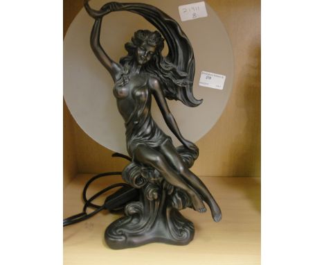 An Art Nouveau-style bronzed lamp
