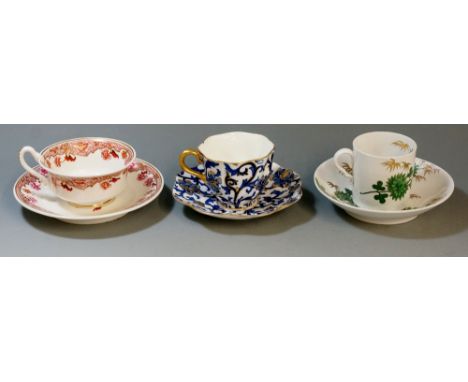 A Coalport blue and white Mandarin pattern cup and saucer, gilded detailing, marked to base with Coalport mark, 158060 in gre