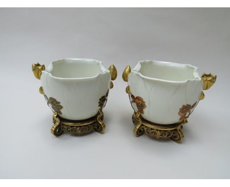 A pair of Royal Worcester water lily jardinieres, 23cm tall