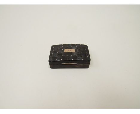 A 19th Century tortoiseshell snuff box with crosshatch detail studded with gold in corners, monogrammed cartouche 