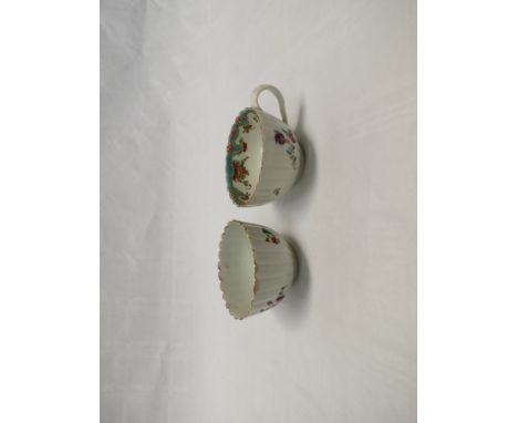 A First Period Worcester polychrome tea cup and tea bowl, with fluted bodies, floral decoration 