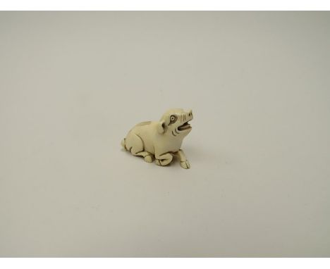 An early 20th Century signed ivory netsuke 