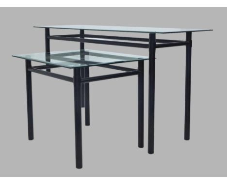 A black steel console table with glass top, 67cm high, 127cm wide, 45cm deep, together with matching side table, 51cm high, 6