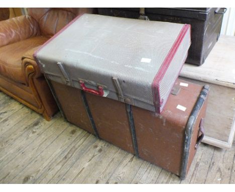 A metal trunk and two cases