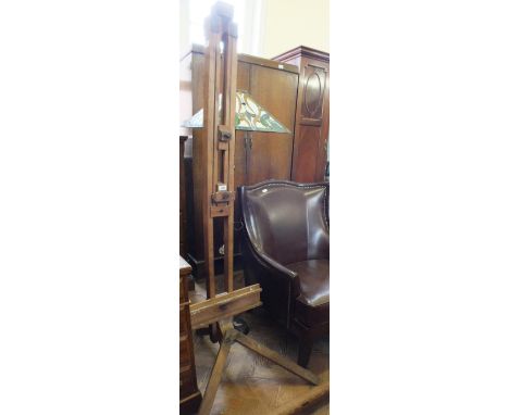 A large vintage wooden artist's easel