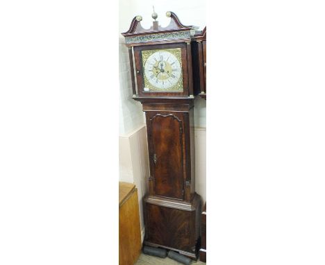 An early 18th Century longcase clock with brass and silvered dial signed "John Halifax, Barnsley".  The case is veneered in f