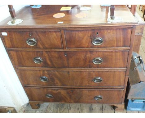 A Victorian mahogany chest of two short over three long drawers on bracket feet