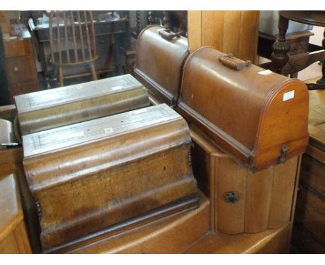 Four various vintage sewing machines including Singer models