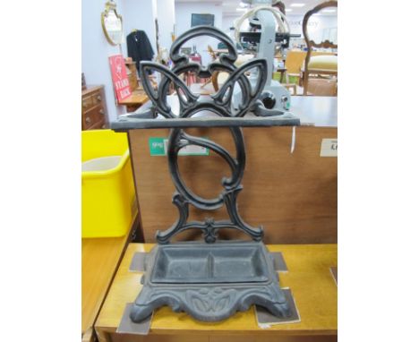 Art Nouveau Style Cast Iron Stick Stand, with two drip trays, shaped base, 58cm high.