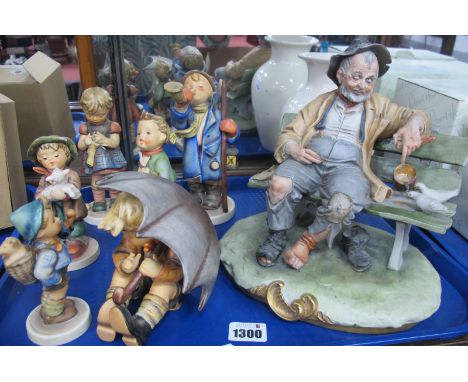 B Merli Capo di Monte Figure of a Tramp, Mason's Chinese Peony vase, Goebel model of a Boy under umbrella and five other mode