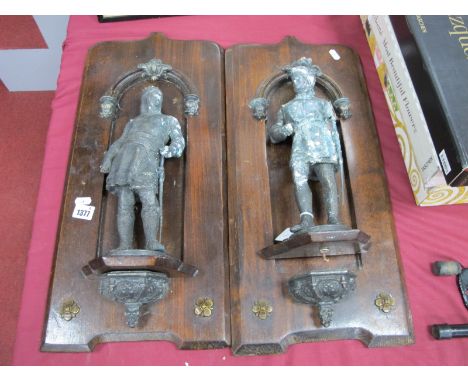 A Pair of Continental Home Stoups, circa 1900, each with separate spelter figure of Knight, stood beneath arch over Holy Wate