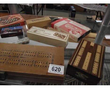 A good lot of games including cribbage, cards, dominoes, draughts and chess travelling set, poker dice etc. 