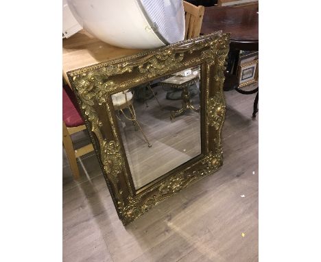 BEAUTIFUL BEVELLED MIRROR IN ORNATED FRAME
