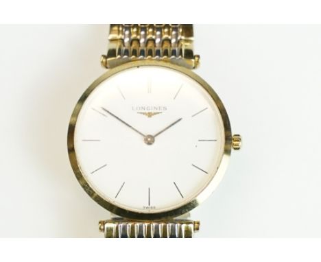 A gents Le Grande Classic De Longines with white enamel dial on original bi metal strap, longings logo to crown. 