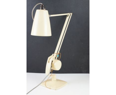 Mid 20th Century Simplus anglepoise lamp having a square base and conical shade finished in cream enamel. 
