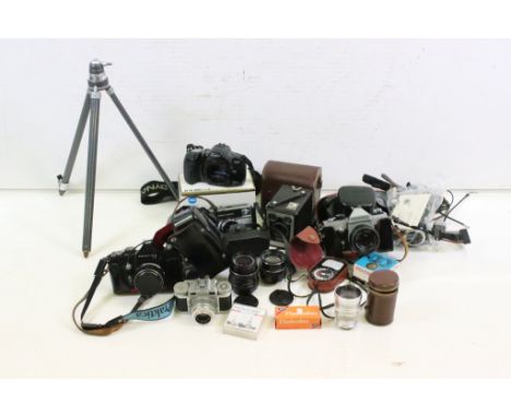 A collection of cameras and photographic equipment to include Minolta, Praktica...etc.. 