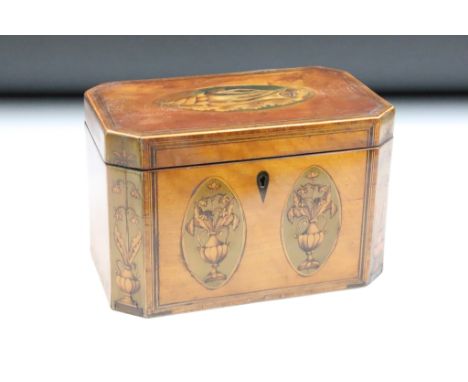 Early 19th century mahogany tea caddy, with inlaid shell &amp; urn decoration, opening to a twin-compartment lidded interior,