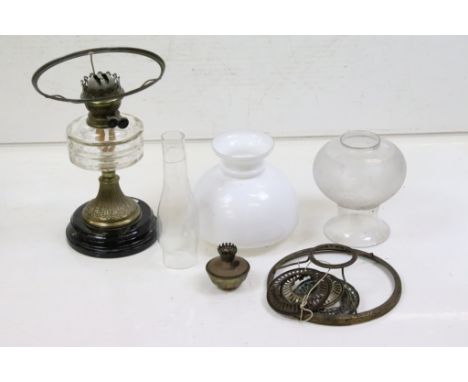 19th Century Victorian oil lamp having a brass reeded base, faceted reservoir and milk glass shade. Together with assorted oi