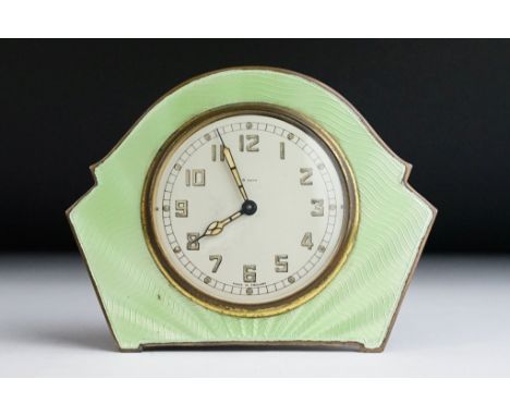 An early to mid 20th century Smith 8-Day green guilloche enamel desk clock. 