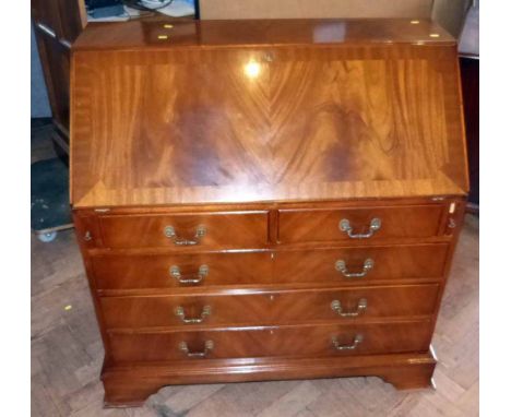 Reproduction mahogany Jaycee fall-front bureau with fitted interior on bracket feet. Condition report: see terms and conditio