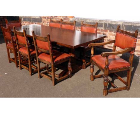 Oak refectory table and eight chairs (1 carver) bearing The Horseshoe Makers mark (formerly Mouseman) and Lizard mark. Condit