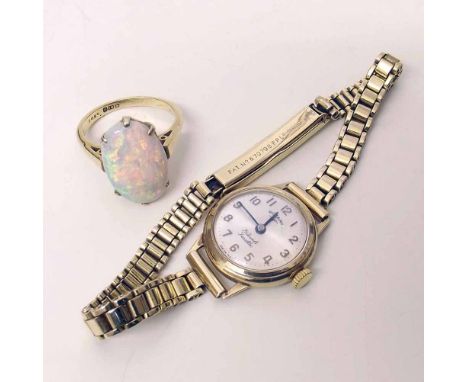 18ct gold opal ring also a 9ct gold Rotary watch. Condition report: see terms and conditions