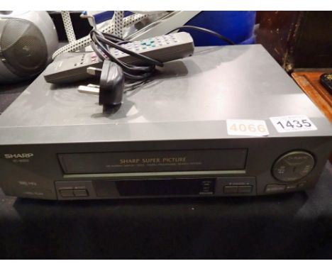 Sharp VC-M303 VHS recorder. All electrical items in this lot have been PAT tested for safety and have passed. This does not c