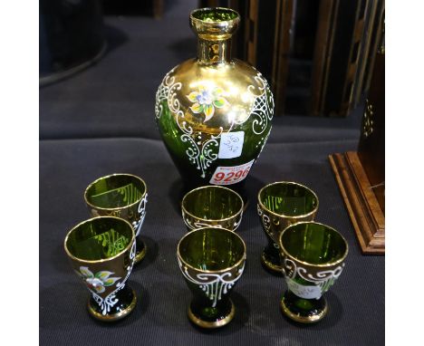 Venetian green glass liquor decanter (H: 17 cm), and six glasses heavily decorated with gilt enamel and flowers, no cracks or