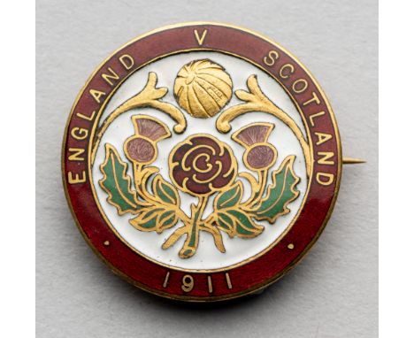 Football Association Official's badge for the England v Scotland International match in 1911,gilt-metal and enamel, inscribed