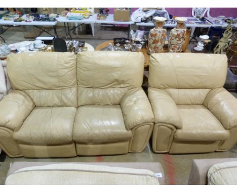 A beige leather two seater sofa and matching armchair