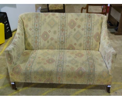 A small Edwardian two seat sofa 