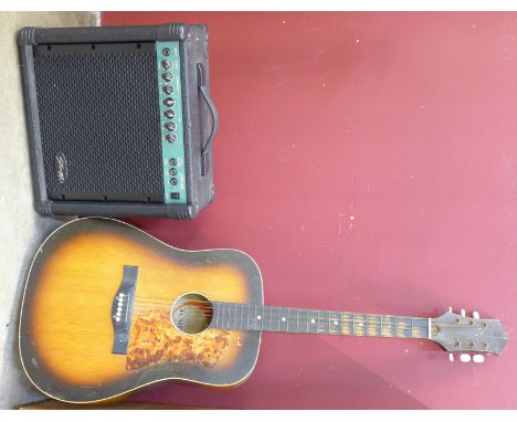 A 1960's Tatra Jumbo acoustic guitar and Stagg amplifier