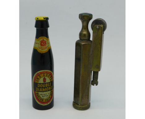 A novelty miniature Double Diamond bottle and a trench art lighter