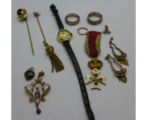 A lady's gold plated Omega wristwatch, two 9ct gold and silver rings, an Art Nouveau 9ct gold amethyst and seed pearl pendant