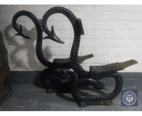 A pair of Victorian cast iron bench ends modelled as serpents 
