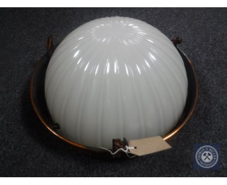 An Art Deco style light fitting with opaque glass shade 