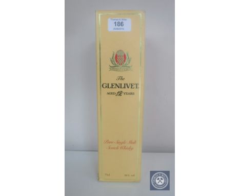 A bottle of Pure Single Malt Scotch Whisky, "The Glenlivet", Aged 12 Years, Distilled in Scotland by George &amp; J.G. Smith,