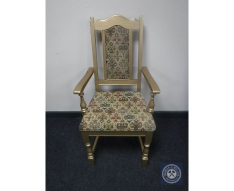 A painted oak tapestry upholstered armchair 