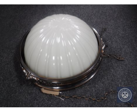 An Art Deco style light fitting with opaque glass shade 