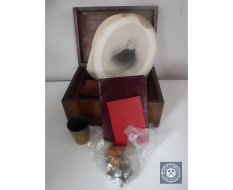 An antique wooden box containing British Railway buttons, eastern brass cup, three portrait pictures etc.
