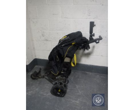 A Power Caddy electric golf cart with carry bag, battery and charger 