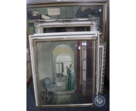 An early 20th century cream and gilt framed tapestry together with two further cream and gilt frames and four framed prints 