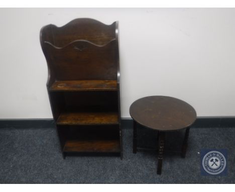 A set of oak Arts and Crafts magazine bookshelves and a lamp table on bobbin legs 