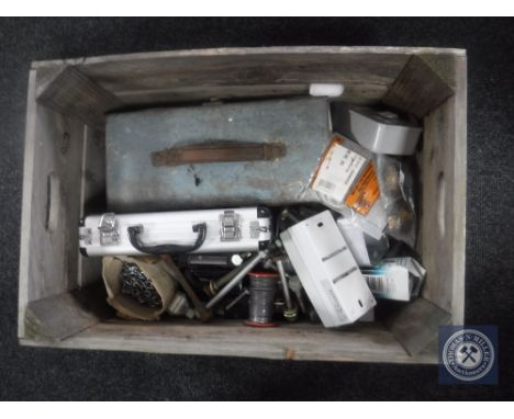 A wooden case containing metal tool box containing ring spanners, small aluminium case containing precision tools, sockets et
