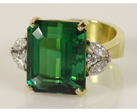 Lady's Vintage Tourmaline, Diamond and 18 Karat Yellow Gold Ring. Center Stone Measures 14mm by 12mm is Flanked on either sid