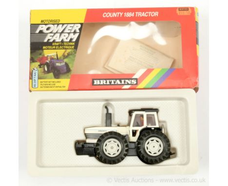 Britains Powerfarm 9324 County 1884 Tractor - finished in off-white, black - Near Mint in a Good rainbow window box (slightly