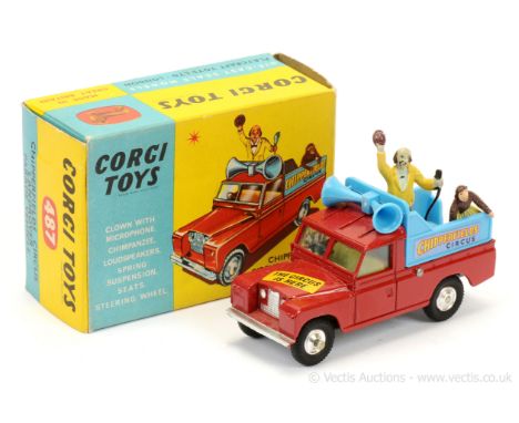 Corgi 487 Land Rover "Chipperfields Circus" Parade Vehicle - red, blue plastic back with "Clown &amp; Monkey" figures, lemon 