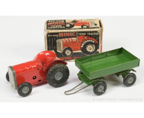Triang Minic 83M Farm Tractor - red, including steering wheel and seat - Good Plus still a bright example in a Poor carded pi