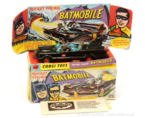 Corgi 267 "Batman" - Batmobile - black body, red bat hubs, blue windscreens with "Batman and Robin" figures, grey plastic aer