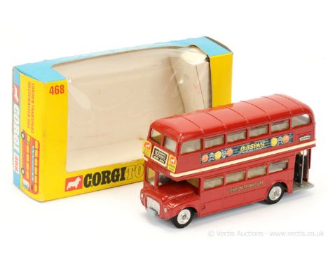 Corgi 468 London Transport Routemaster Bus "Outspan" adverts - red body, cream interior, clear stairs, silver trim, cast hubs